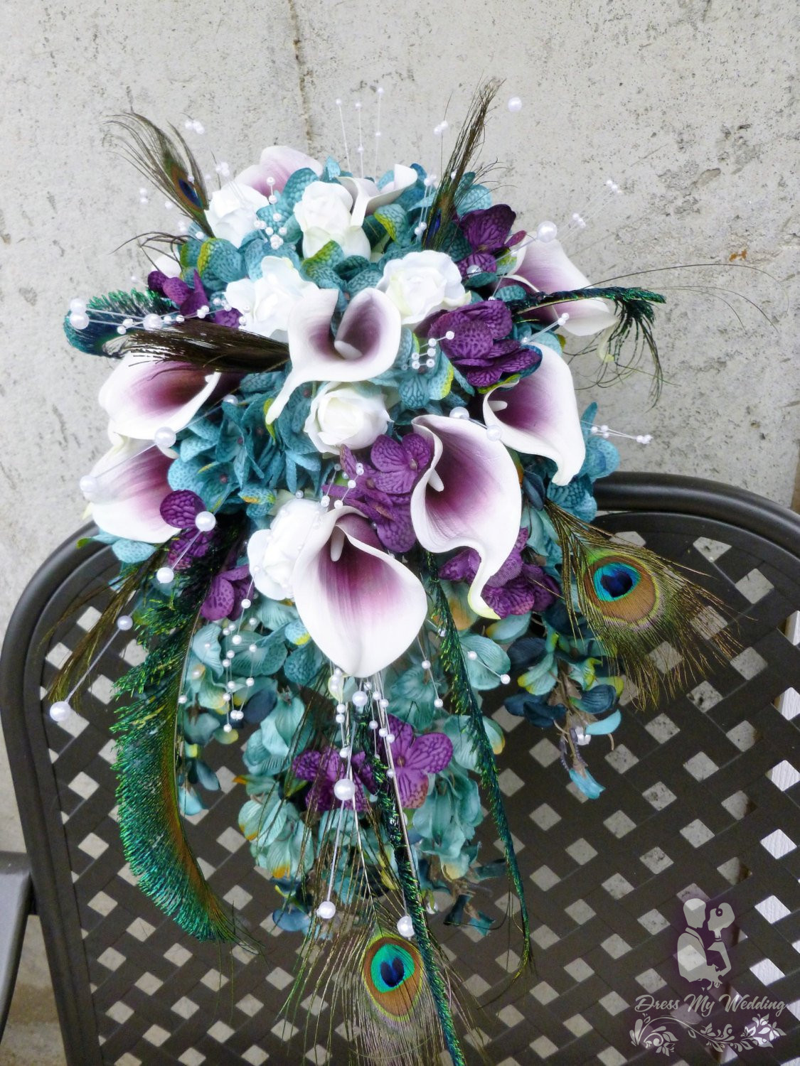 Dress My Wedding – Teal plum cascading bouquet with picasso calla