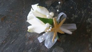 Rose corsage, boutonniere with starfish
