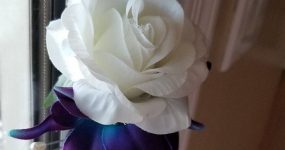 Rose and galaxy orchid boutonniere